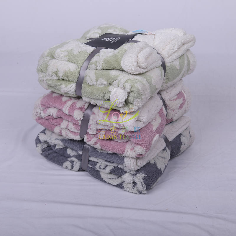 Double layer blanket,top is jacquard sherpa and back is solid sherpa
