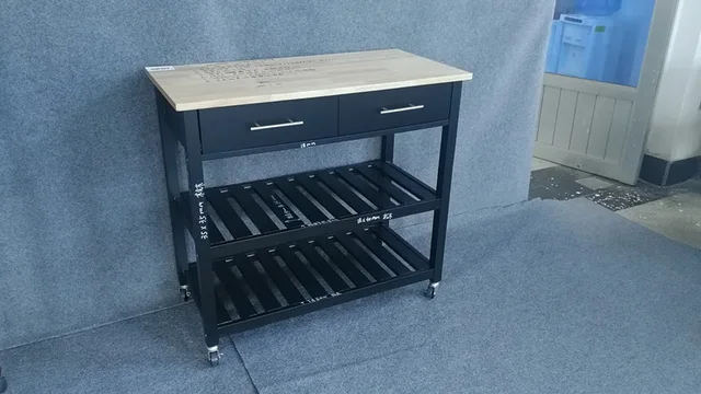 Black Moveable Kitchen Trolleay with locked wheel and solid wood table top
