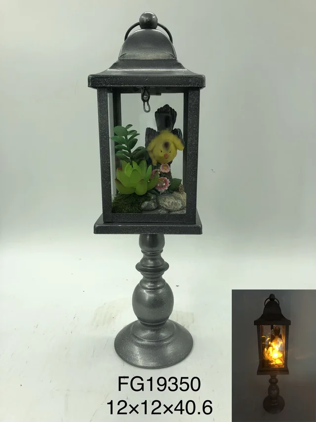 Metal lantern with polyresin inserted and LED