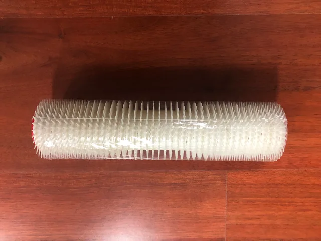 Spike roller
