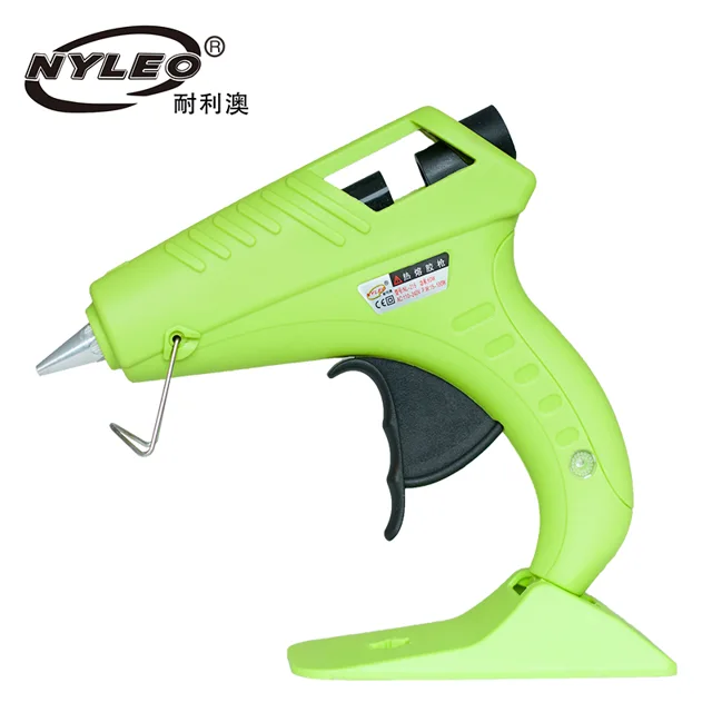 Hot melt glue gun with base