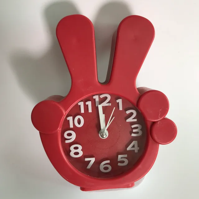 Plastic win shaped kids alarm clock