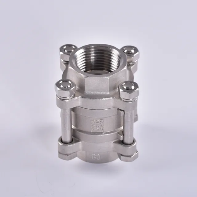 Three piece stainless steel vertical spring chek valve