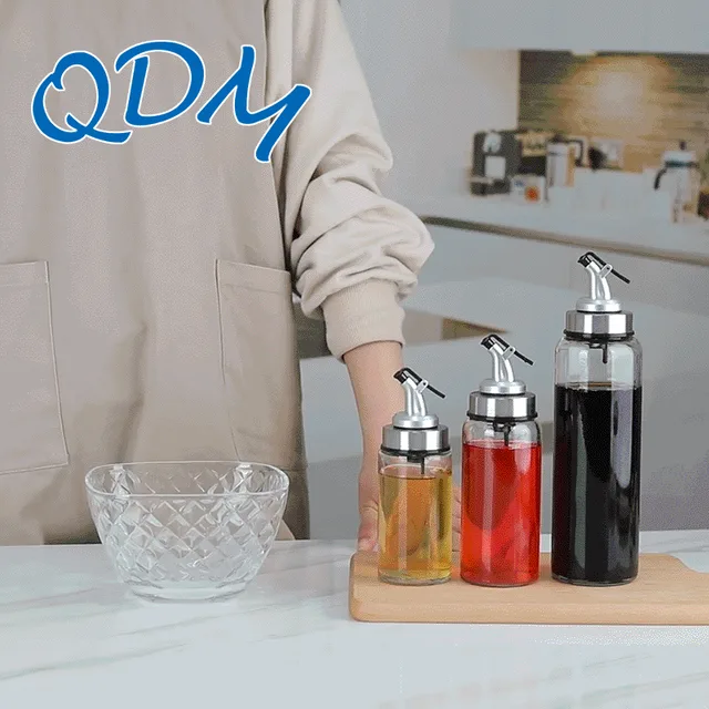 Glass oil bottle with plastic lid