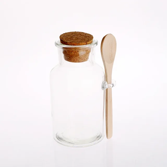 Glass canister with cork lid and bamboo spoon