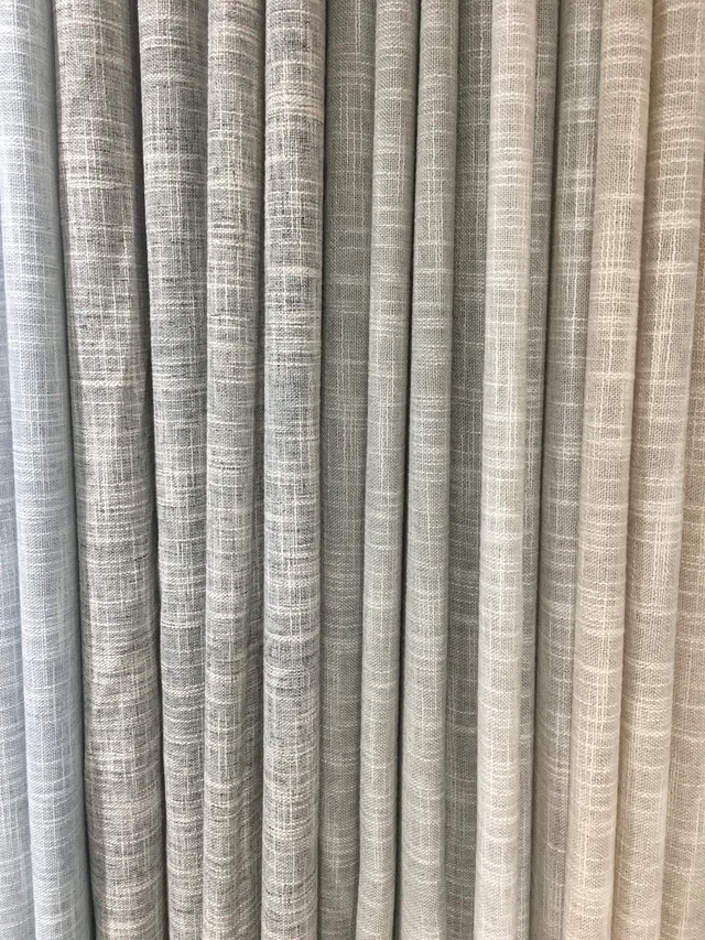 A cross slub faux linen curtain