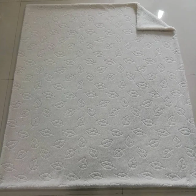 Jacquard with silver lint sherpa blanket and cushion