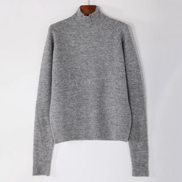 Women knitted pullover with half neck