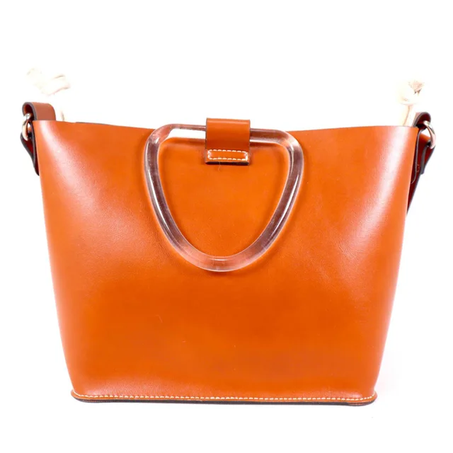 Tan resin handle drawstring cross body