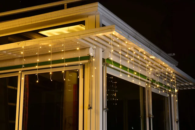 30V20x6L LED Icicle Lights,clear wire,warm white bulb color,bulb distance 10cm,string distance 15cm.
