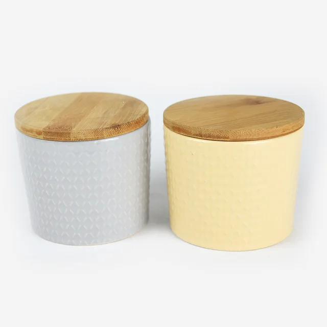 4‘’ ceramic glaze canister with bamboo lid & embossment