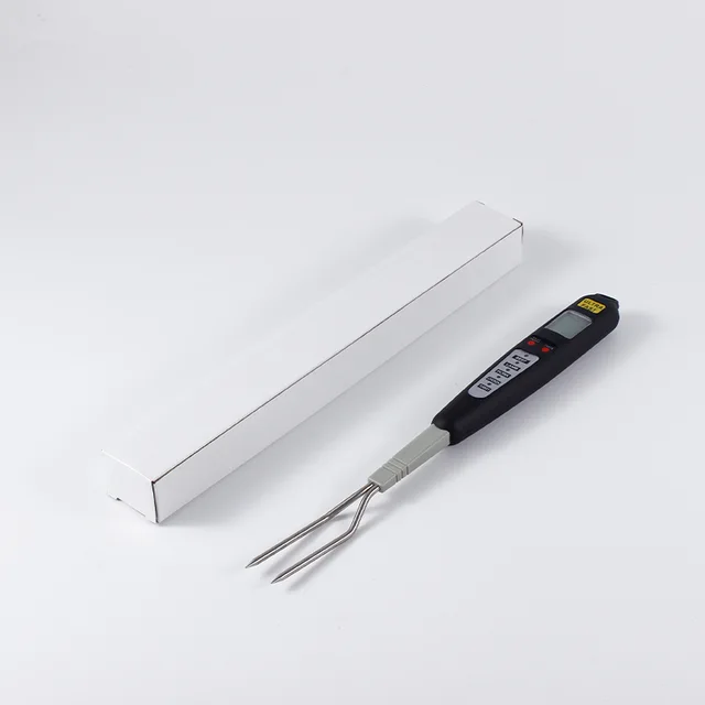 Barbecue fork with thermometer