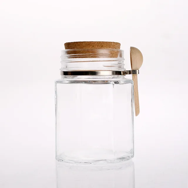 Glass canister with cork lid and bamboo spoon