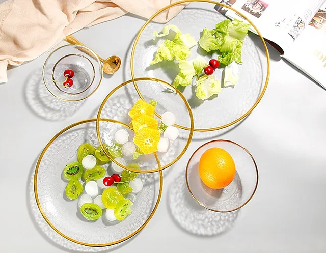 Clear plate with wide gold rim and hammer pattern，GLASSWARE