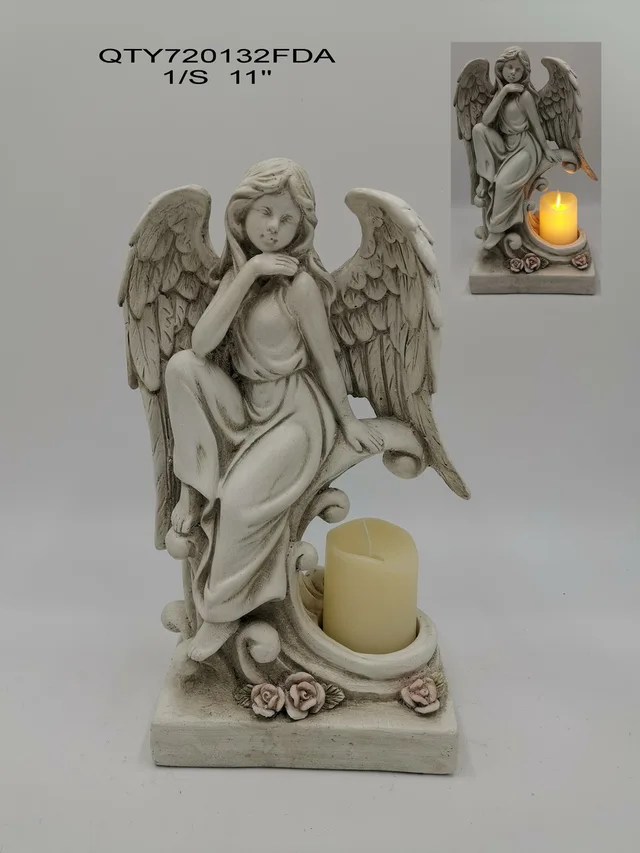 Cemetery angel with candle
