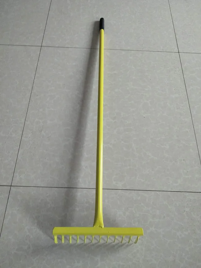 Rake with steel handle