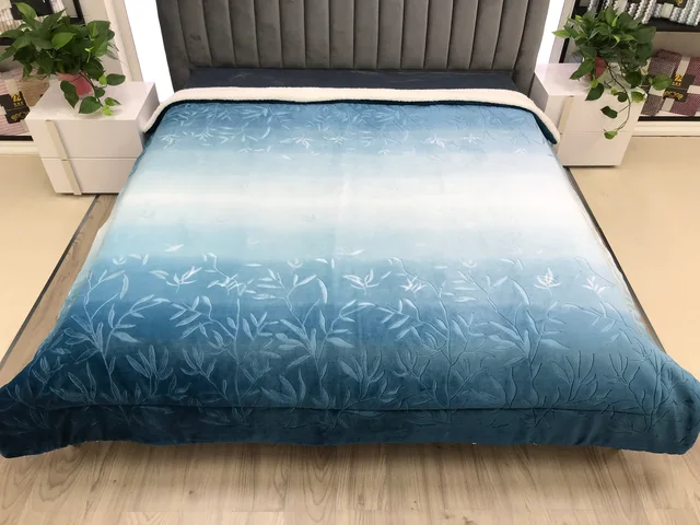 Printed with leaf pattern embossed flannel with sherpa quilting comforter Blue