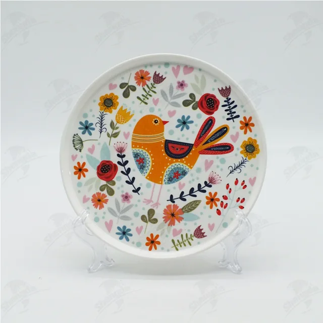 7" pizza plat with flower & bird design