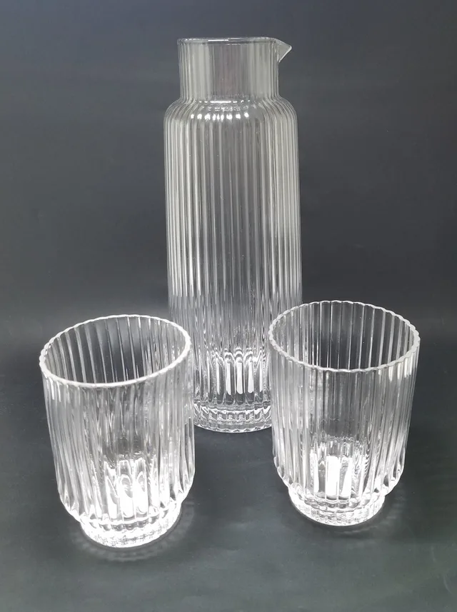 Ribbed glass pitcher