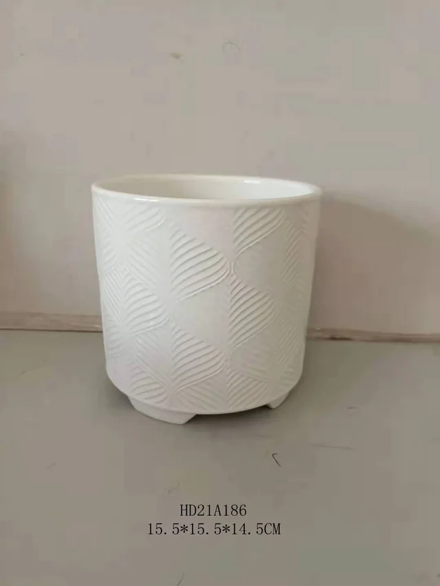 Popular sale texture design ceramic plant pot with legs
