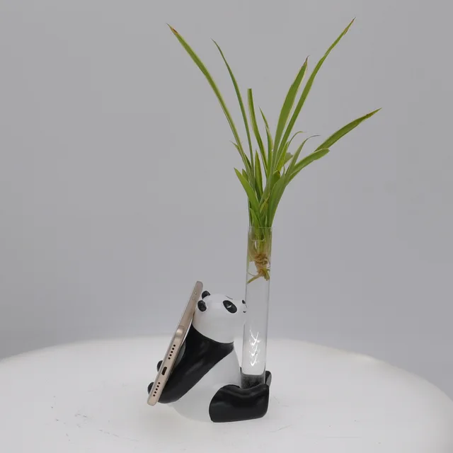 Wholesale Polyresin cartoon panda sculpture water plant cell photo stand statue custome for home decoration