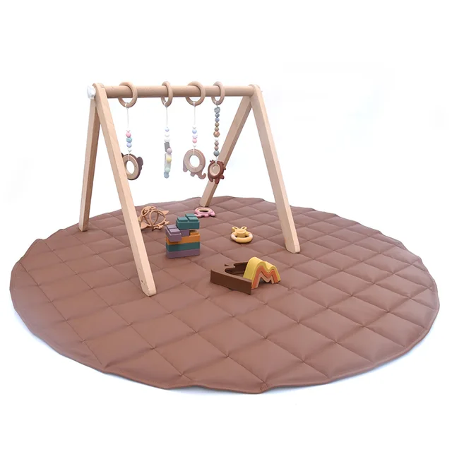 Wood Baby Gym with hanging toy play activity mat