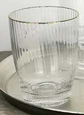 Hand blown crystal ribbed tumbler glass with gold rim